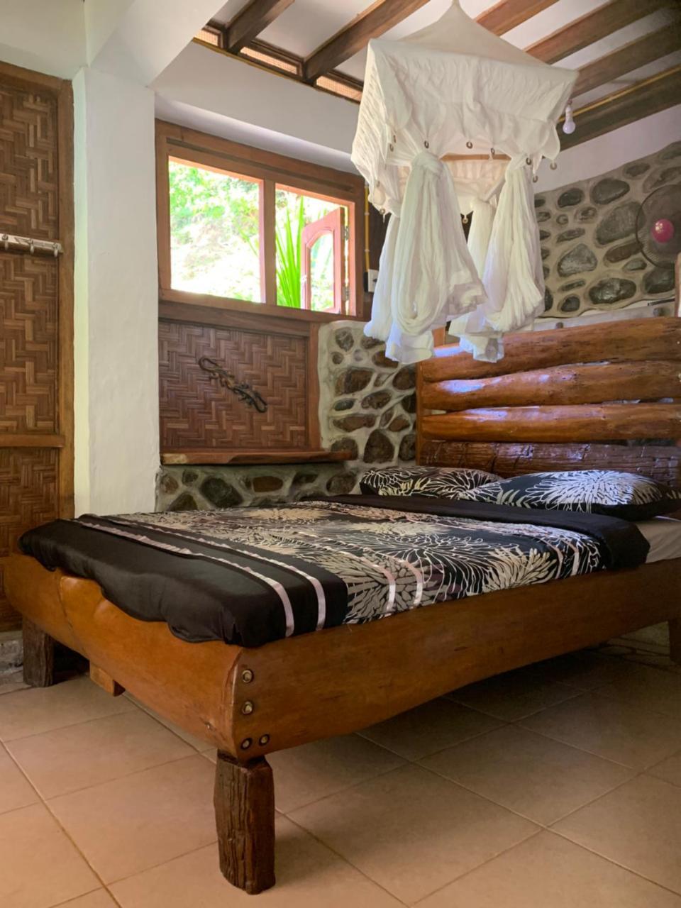 Kupu Kupu Garden Guest House & Cafe Bukit Lawang Eksteriør bilde